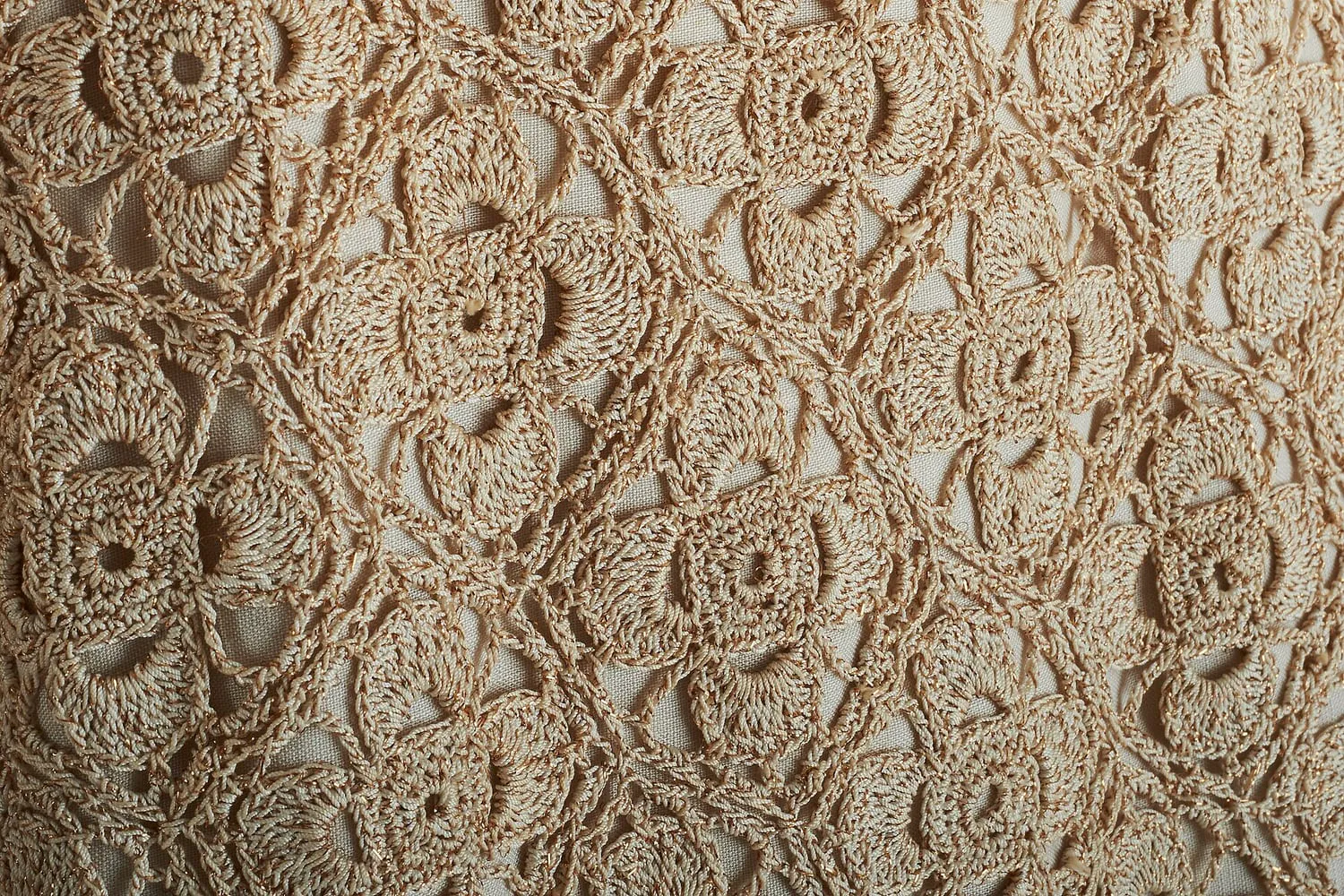 A delicate garment laid flat to dry on a towel